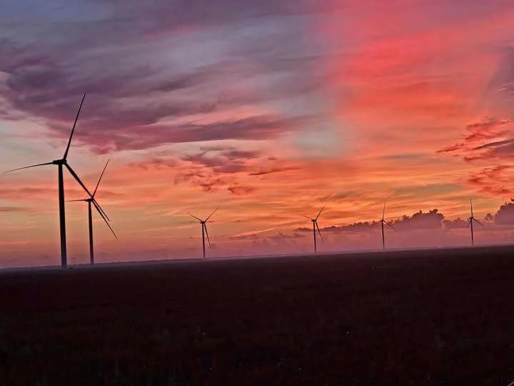 Wind turbines at sunset
